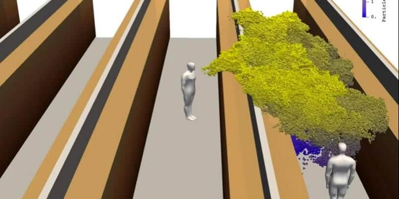 Une simulation 3D d'une personne qui tousse dans un environnement intérieur